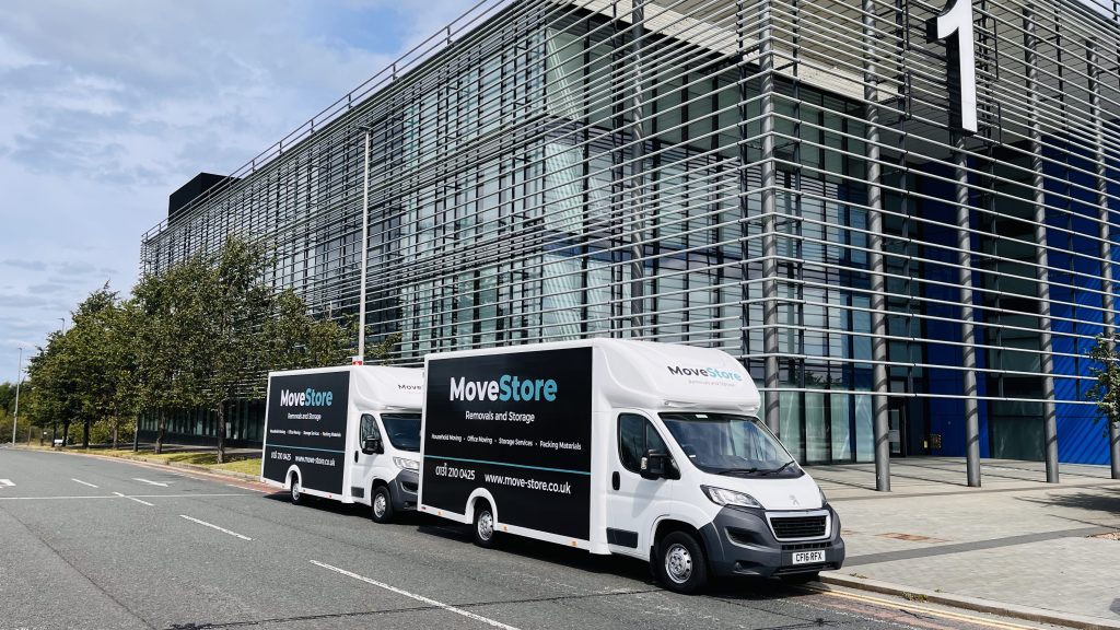 Edinburgh office moves by MoveStore removal service. Vans sitting outside a commercial building in Edinburgh