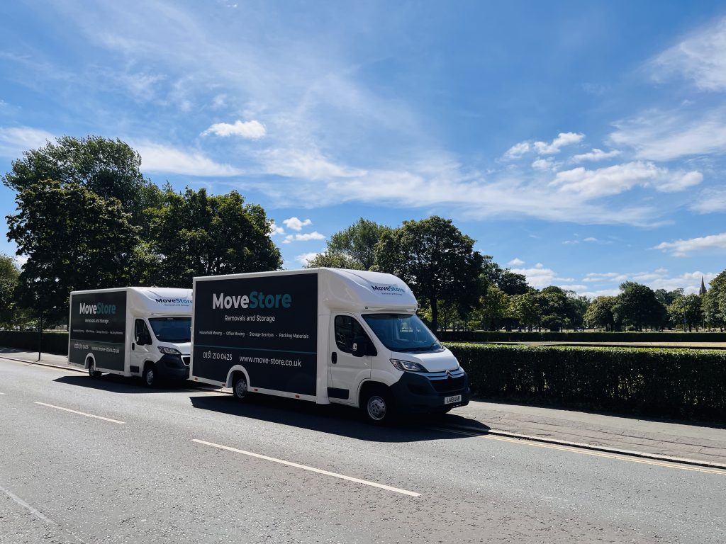 MoveStore Edinburgh removals company vans pictured in a sunny day in Edinburgh
