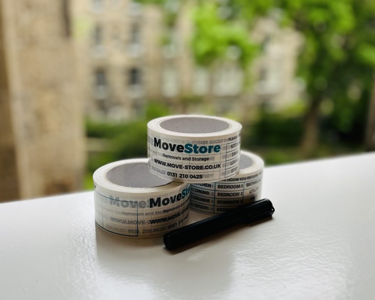 MoveStore packing tape and a pen