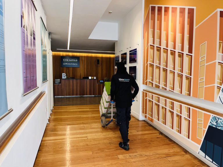MoveStore staff moving documents in an Edinburgh office