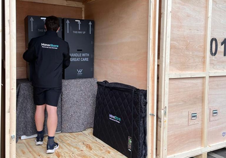 MoveStore staff loading a van for a part removal service