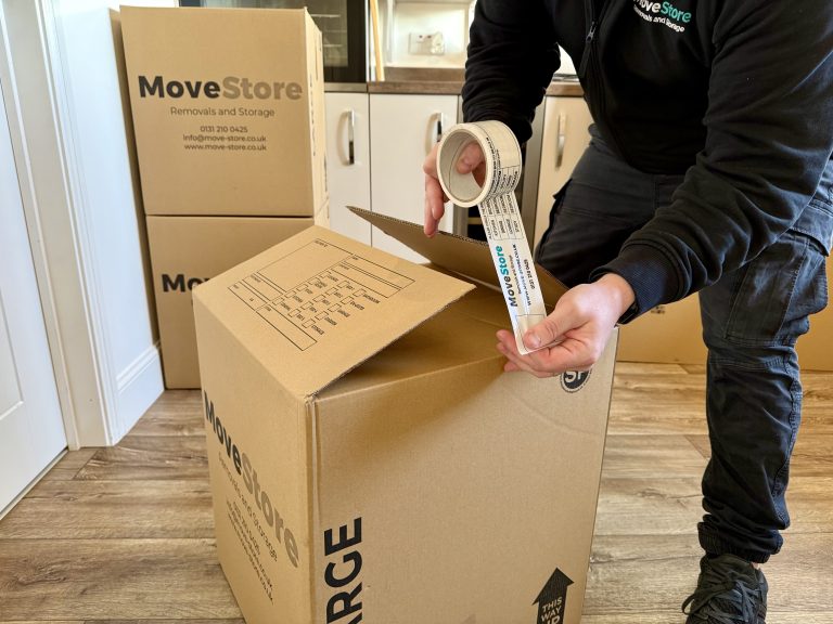 Taping a packed MoveStore box