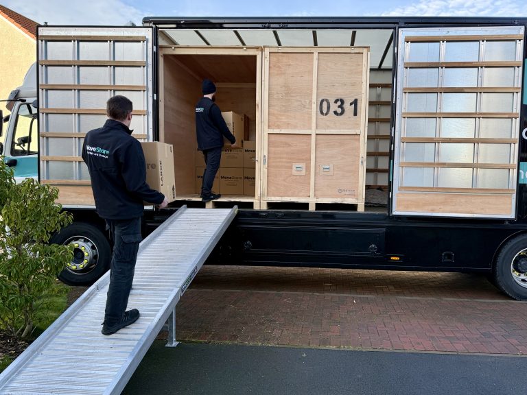 Loading a MoveStore storage container at a client's property